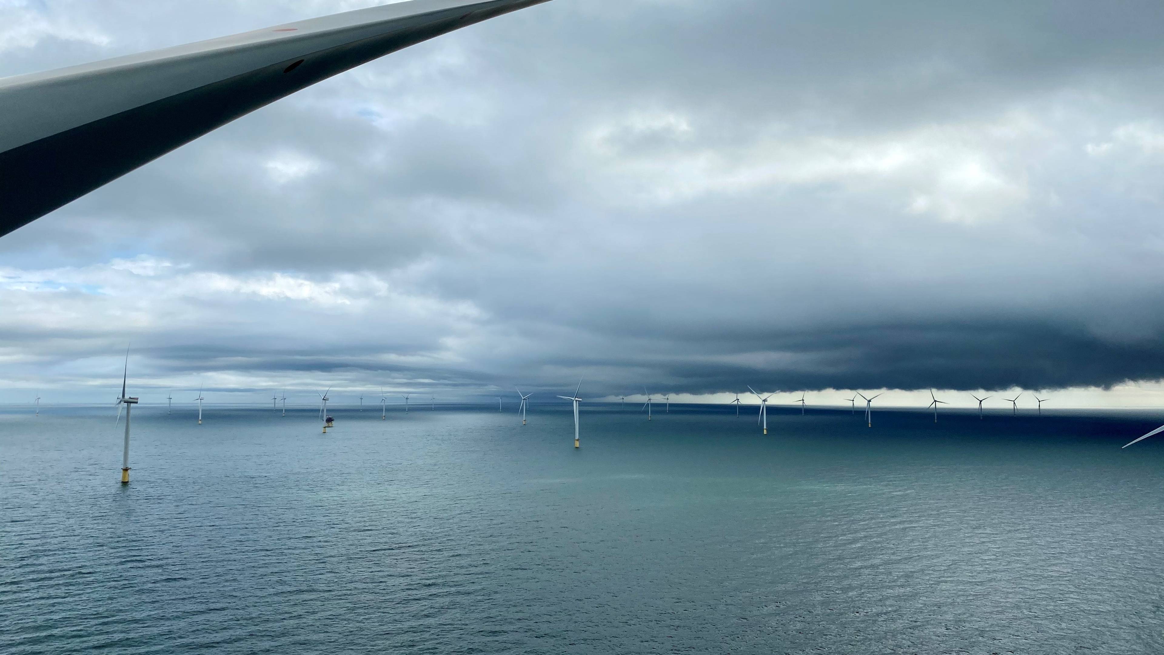 Dudgeon Offshore Wind Farm blades and cloudy skies
