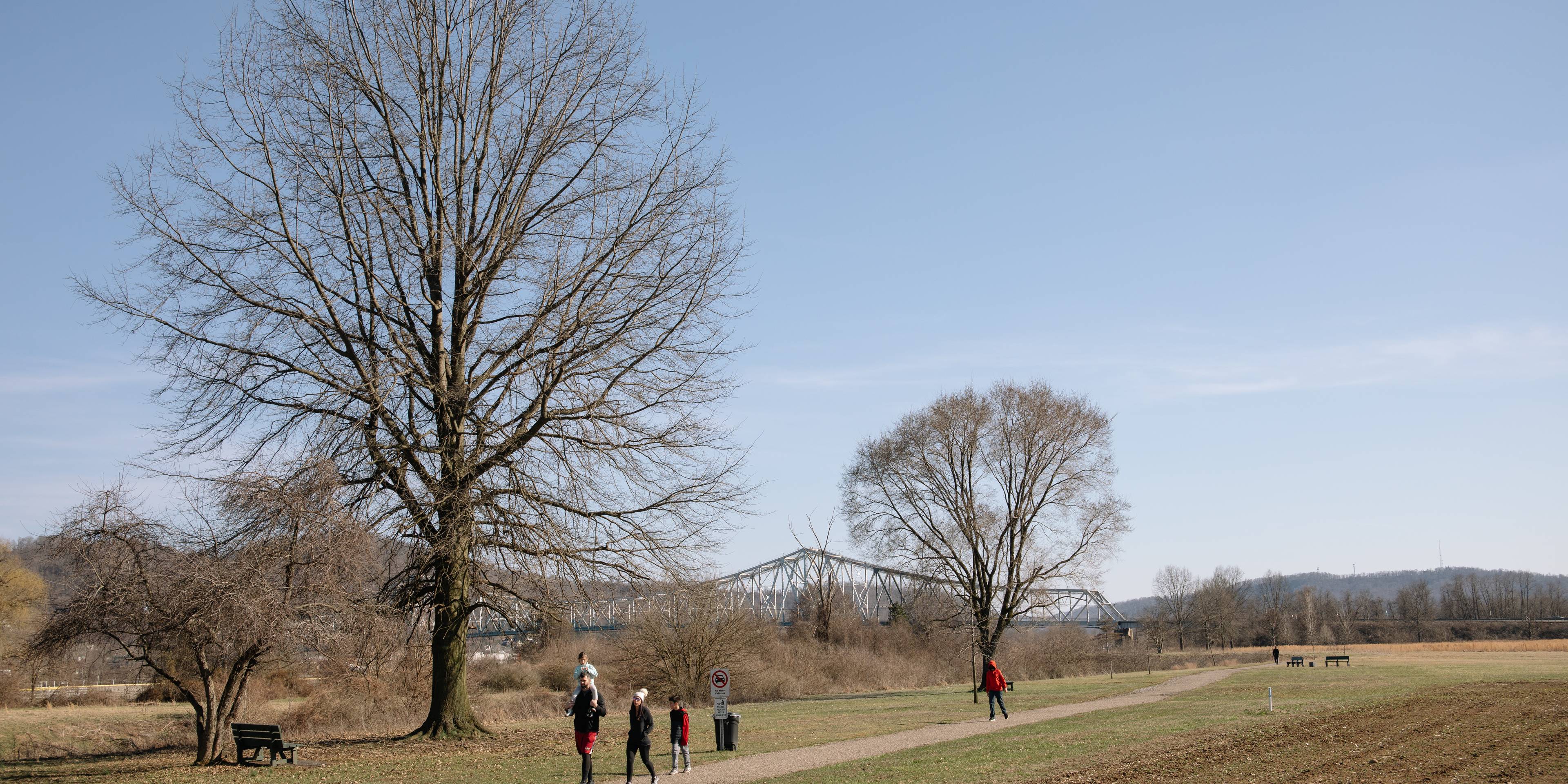 Family walking in rural environment in the Appalachian region, Ohio.